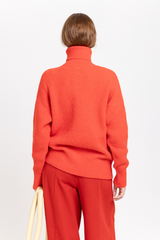 Red alpaca turtleneck sweater