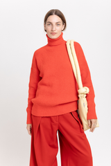 Red alpaca turtleneck sweater