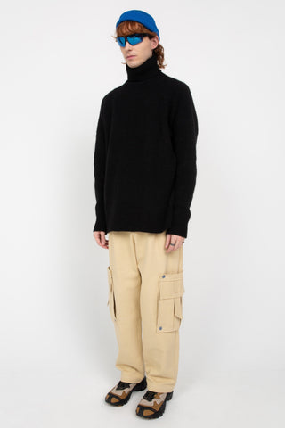 Black rollneck sweater