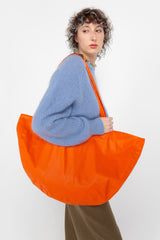 Orange half moon bag