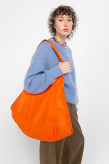 Orange half moon bag