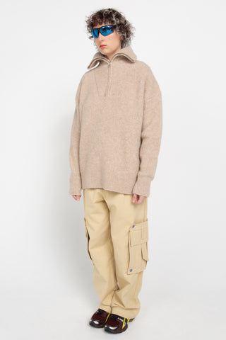 Beige half-zip sweater