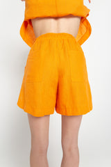 Orange elasticated shorts